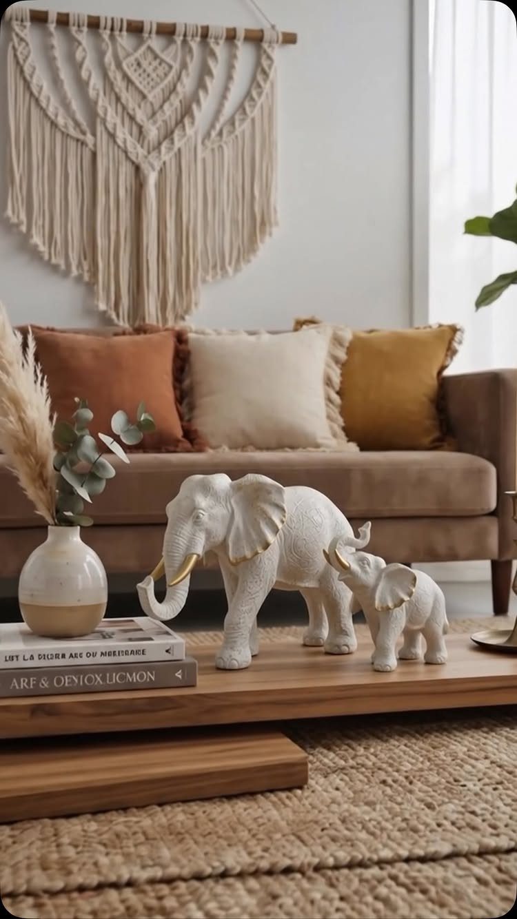 Pampas grass in a vase on a wooden coffee table in a boho living room.