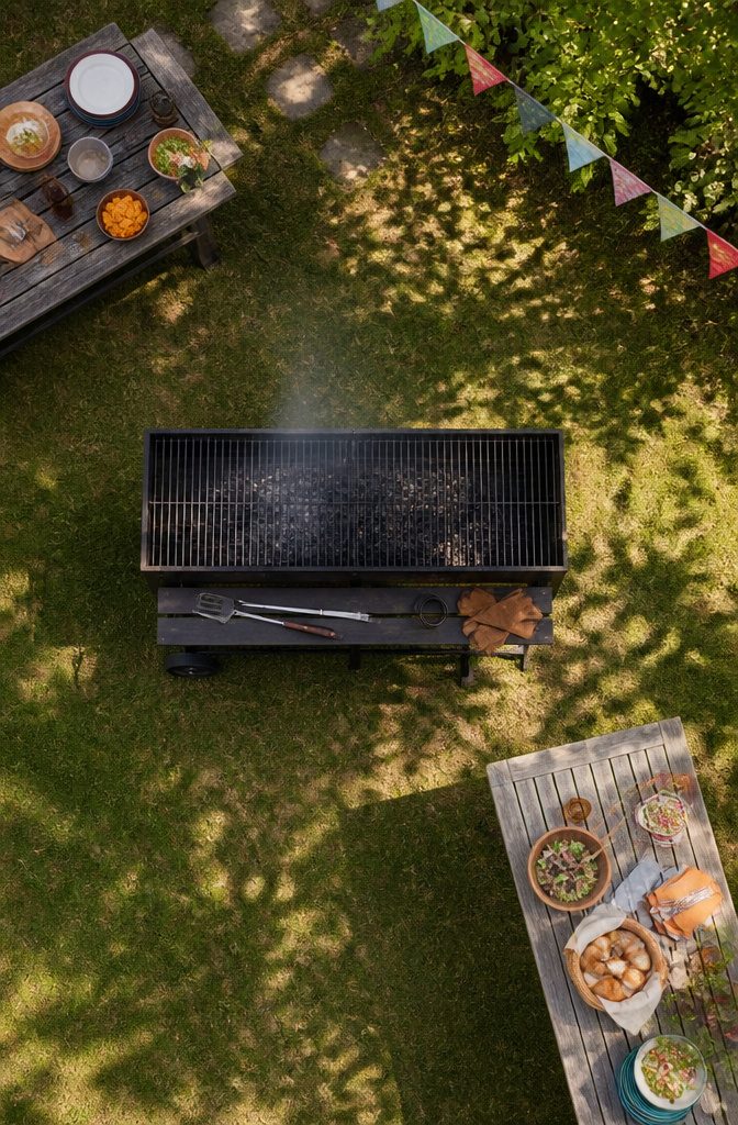 Rustic Outdoor Barbecue Grill Styles and Options for 2026 5 Large charcoal grill designed for cooking for about thirty people.
