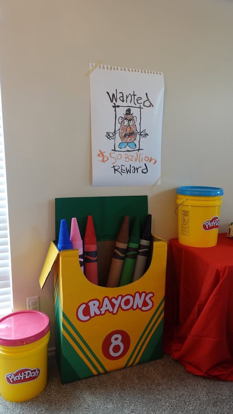 12 Toy Story Bedroom Ideas for Kids Who Love Woody and Buzz 11 Giant crayon box and Mr. Potato Head wanted poster in a child's bedroom