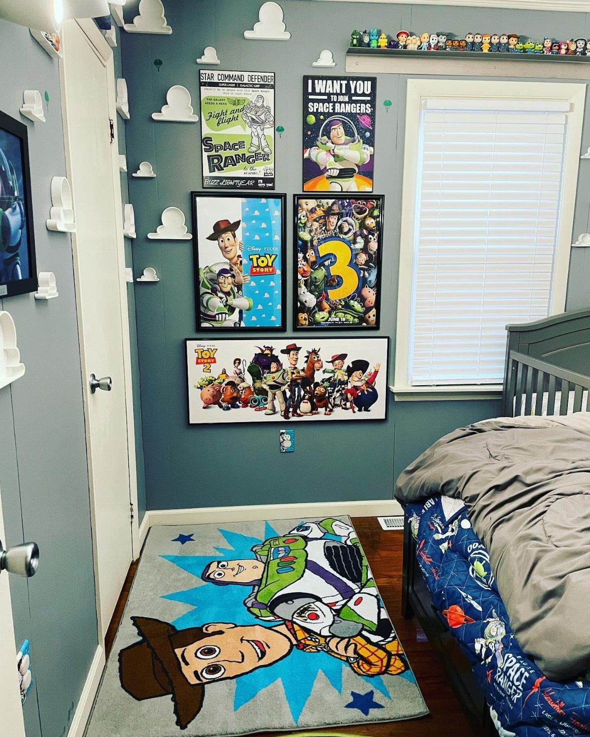 12 Toy Story Bedroom Ideas for Kids Who Love Woody and Buzz 7 Toy Story rug with Woody and Buzz on a blue bedroom floor